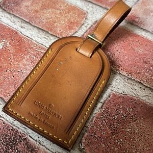 Authentic Louis Vuitton luggage bag tag